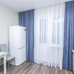 Фото Апартаменты на улице Каролинского 9