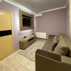 4-местный 2-комнатный номер люкс с 1 двуспальной кроватью