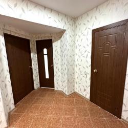 Фото Отель Уютная квартира на улице Академика Завойского 17