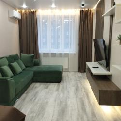 Фото Отель Современная двухкомнатная квартира с кухней-гостиной