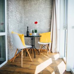 Фото Отель UzorApart Просторная евродвушка у пляжа Алексино с видом на закат