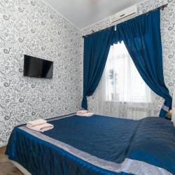 Комната студио с кроватью размера «king-size» и диван-кроватью