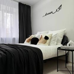 Фото Стильные апартаменты с видом на колесо Обозрения