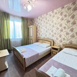 Номер стандарт улучшенный с 1 односпальной и 1 двуспальной кроватью