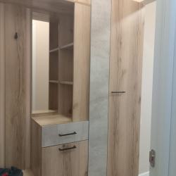 1-комнатные апартаменты улучшенные Серая квартира-студия с одной большой кроватью