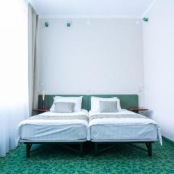 Двухместный стандартный номер с одной большой или двумя кроватями