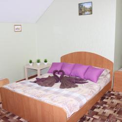 Номер улучшенный стандарт с 4 односпальными и 1 двуспальной кроватью