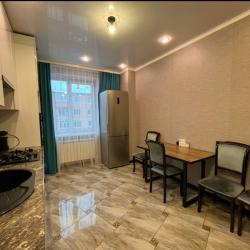 Фото Апартаменты Happy Home(ХэппиХоум) на улице Зураба Магкаева 83/3