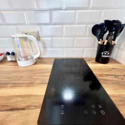 1-комнатные апартаменты люкс на 17 этаже с видом на реку Тура