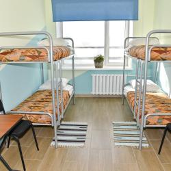 Кровать в 4-местном общем номере с двухъярусными кроватями