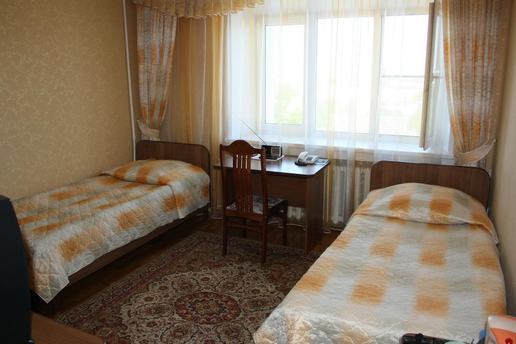 Номер стандарт с 2 односпальными кроватями 3