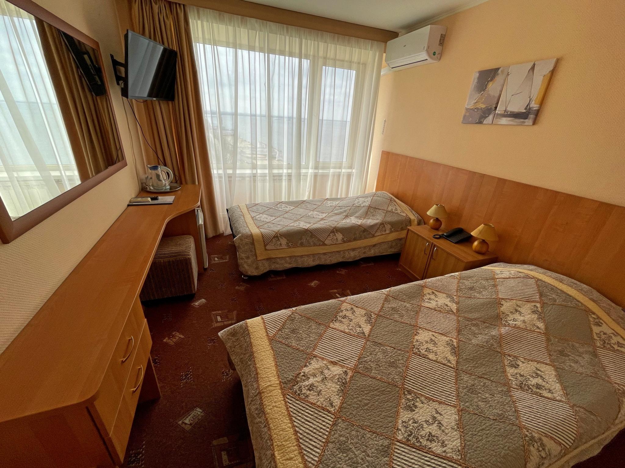 Номер стандарт с 2 односпальными кроватями
