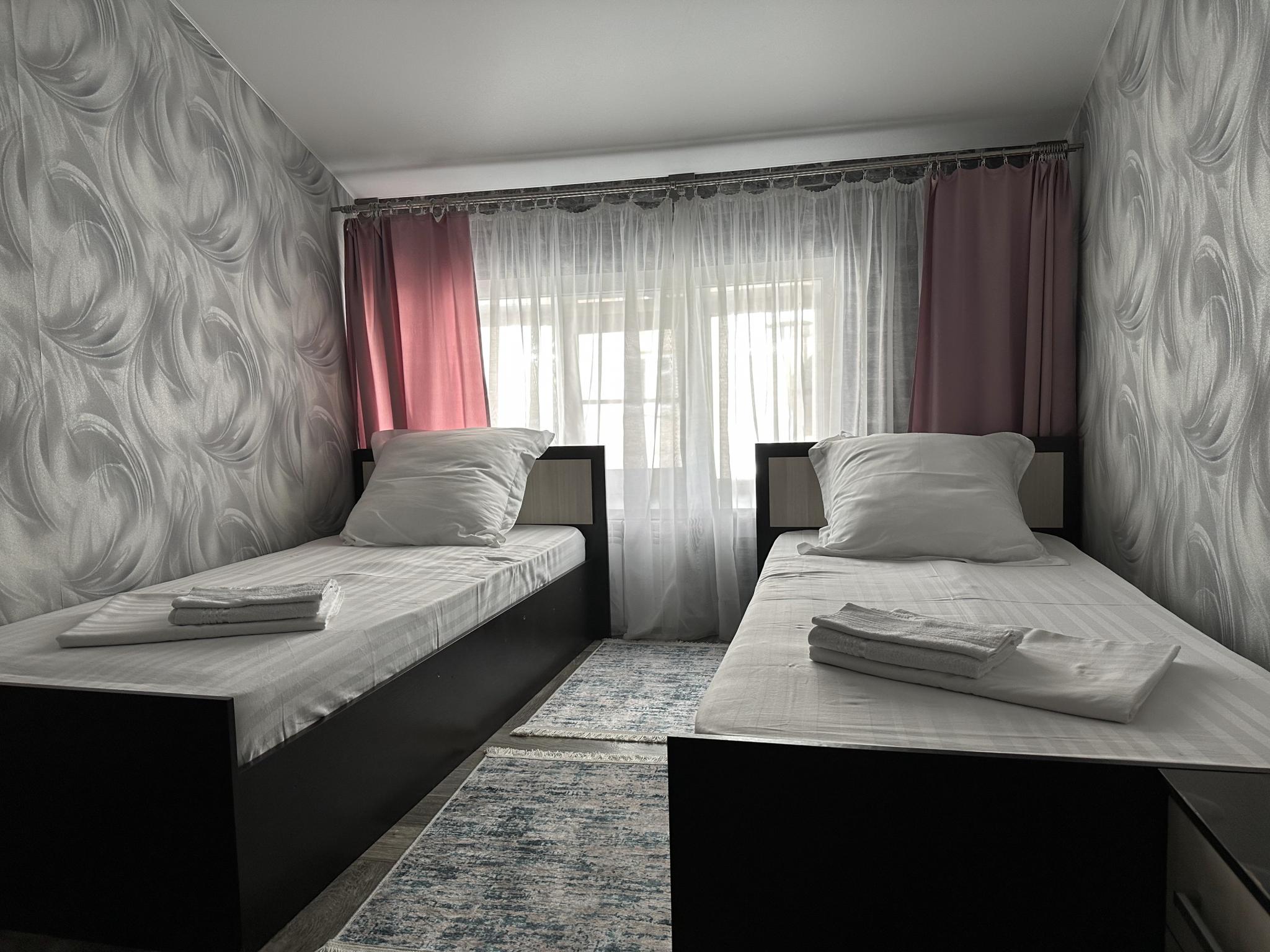 Номер стандарт с 2 односпальными кроватями 3