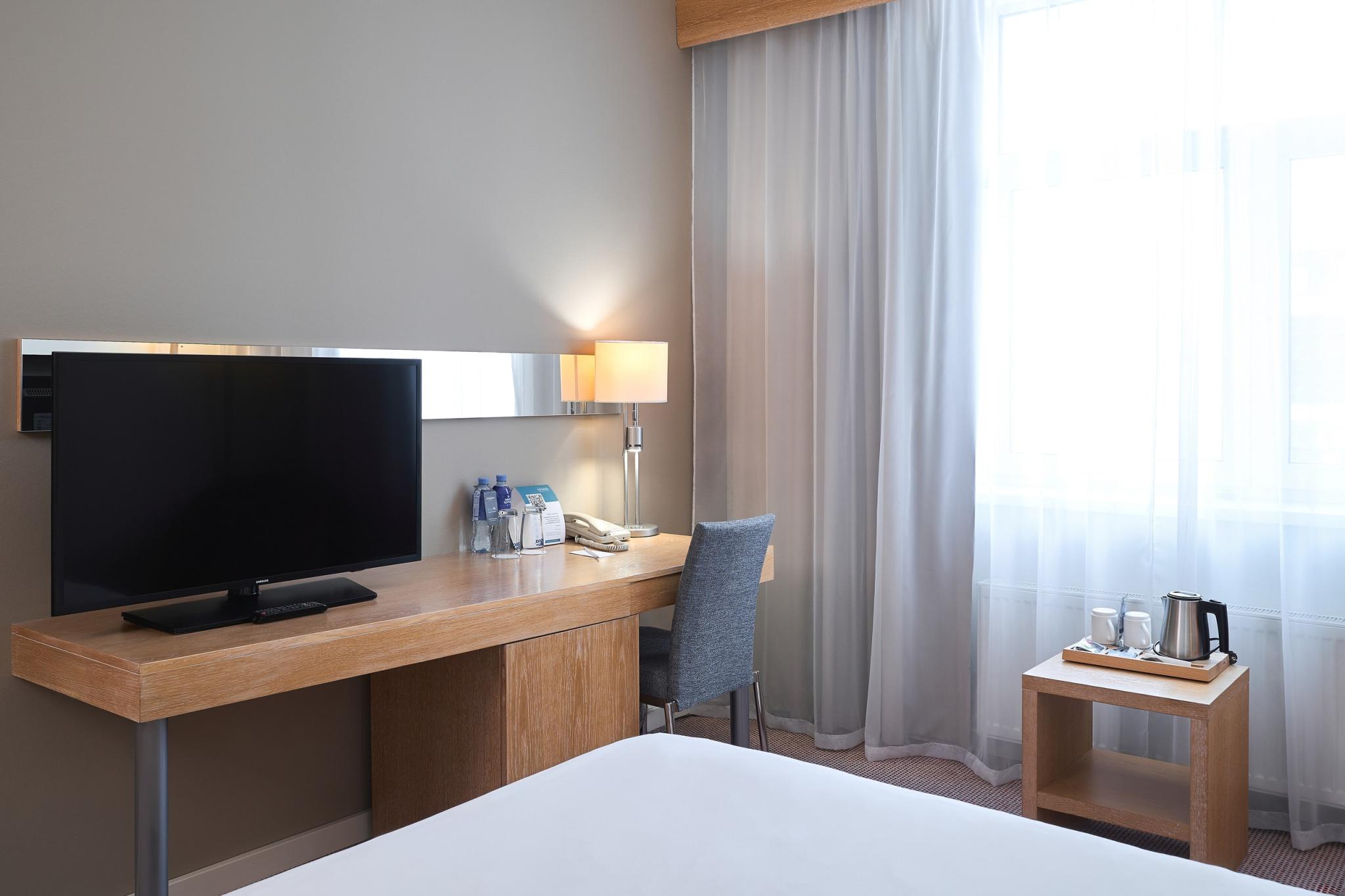 Номер стандарт с 1 двуспальной кроватью 4