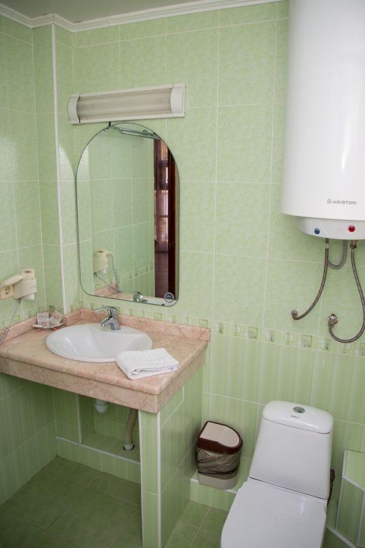 Номер стандарт с 2 односпальными кроватями в коттедже 3
