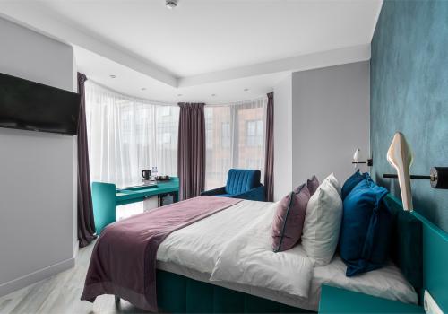 Номер улучшенный с 1 двуспальной кроватью NEW