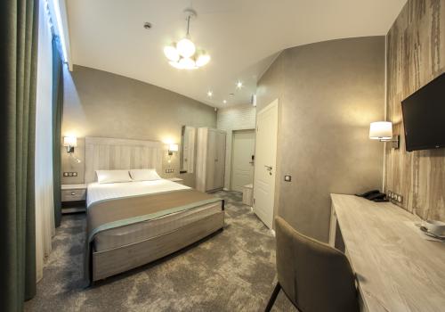 Номер стандарт с 1 двуспальной кроватью