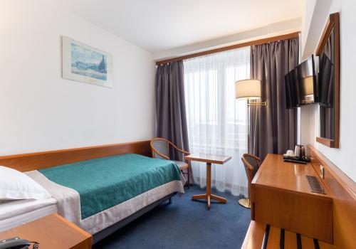 Номер стандарт бизнес с 1 односпальной кроватью