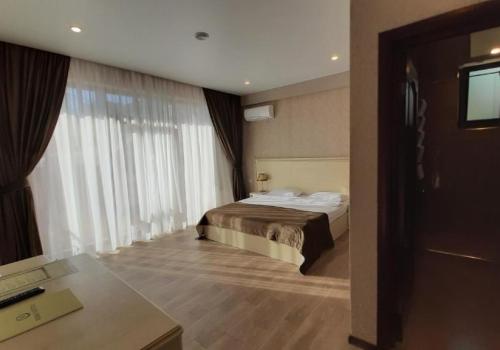 Номер стандарт с 1 двуспальной кроватью