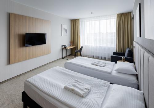 Номер стандарт бизнес с 2 односпальными кроватями