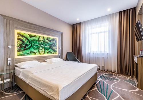 Номер полулюкс с 1 двуспальной кроватью