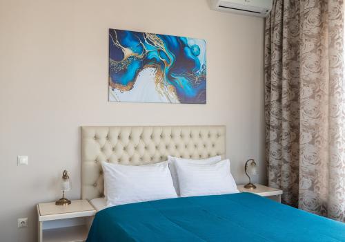 Номер люкс семейный с 1 двуспальной кроватью