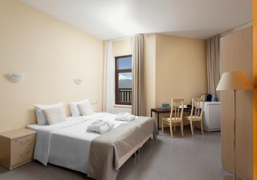 Фото Отель Riders Lodge