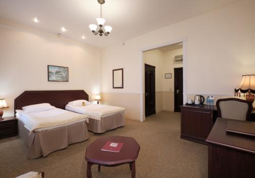 Номер стандарт бизнес с 2 односпальными кроватями