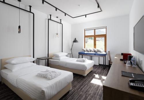 Номер супериор с 2 односпальными кроватями и душем