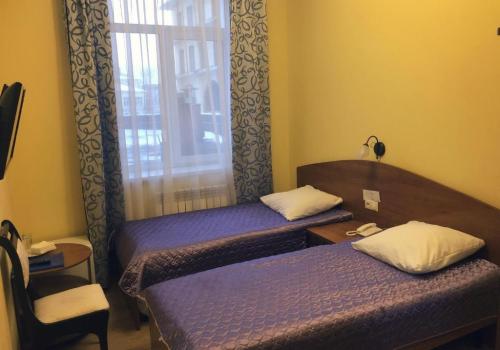 Номер стандарт с 2 односпальными кроватями