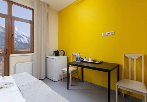 Фото Отель Riders Lodge