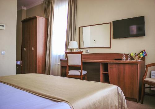 Номер стандарт с 1 двуспальной кроватью