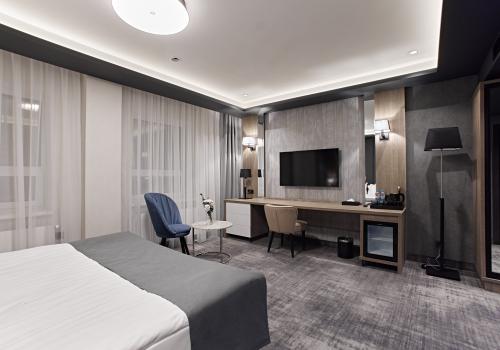 Номер стандарт с 1 двуспальной кроватью