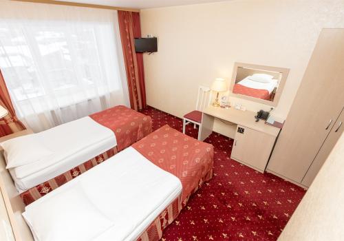 Номер стандарт бизнес с 2 односпальными кроватями