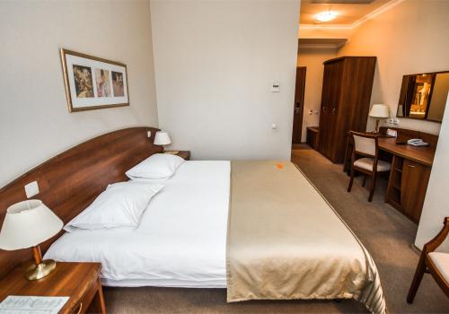 Номер стандарт с 1 двуспальной кроватью