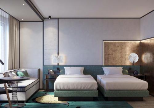 Номер стандарт с 2 односпальными кроватями на высоком этаже