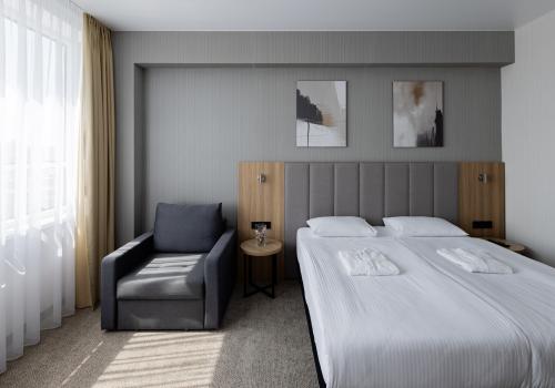 Номер стандарт бизнес с 1 двуспальной кроватью