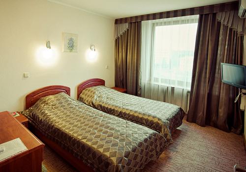 Номер люкс с 2 односпальными кроватями