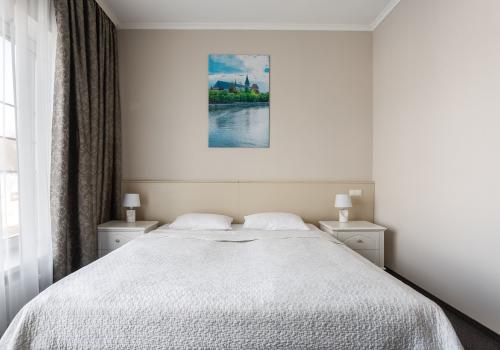 Номер стандарт улучшенный с 1 двуспальной кроватью