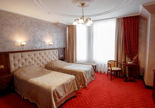 Номер стандарт с 2 односпальными кроватями (без окна)