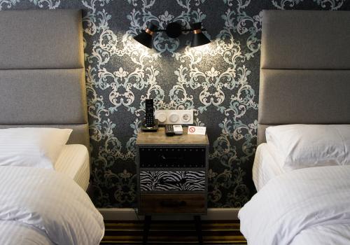 Номер делюкс с 2 односпальными кроватями