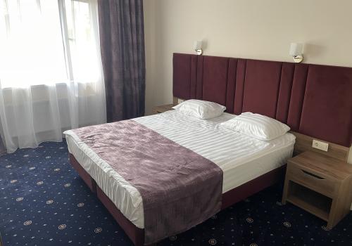 Номер стандарт улучшенный с 1 двуспальной кроватью