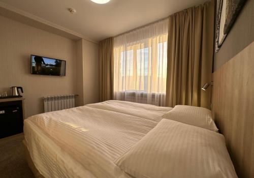 Фото Амакс Сити Отель