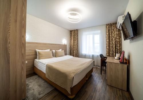 Номер стандарт с 1 двуспальной кроватью