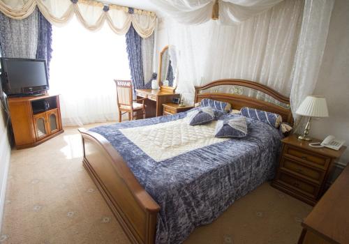 Номер люкс улучшенный с 1 двуспальной кроватью