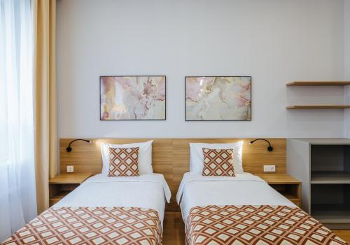 Номер студия стандарт с 2 односпальными кроватями