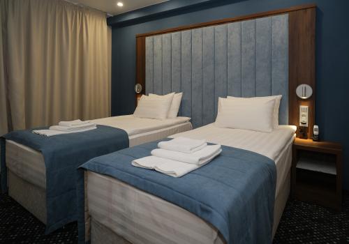 Номер люкс с 2 односпальными кроватями