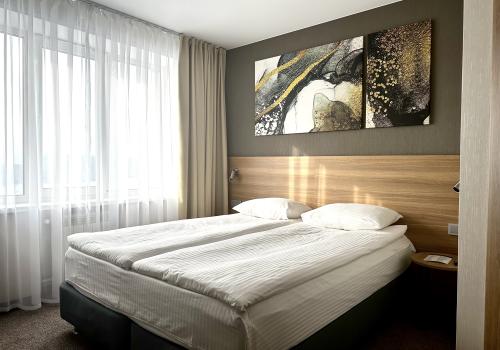 Номер улучшенный стандарт с 1 двуспальной кроватью