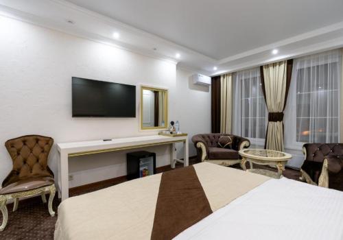 Номер делюкс с 1 двуспальной кроватью