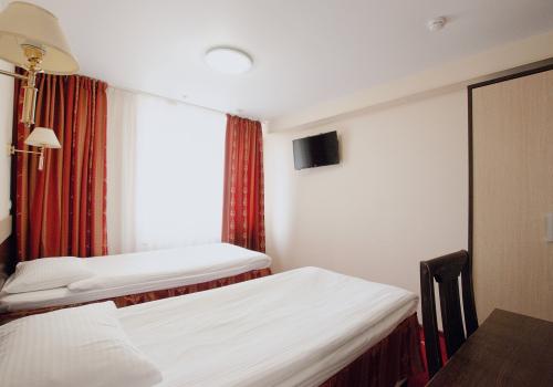 Номер стандарт с 2 односпальными кроватями